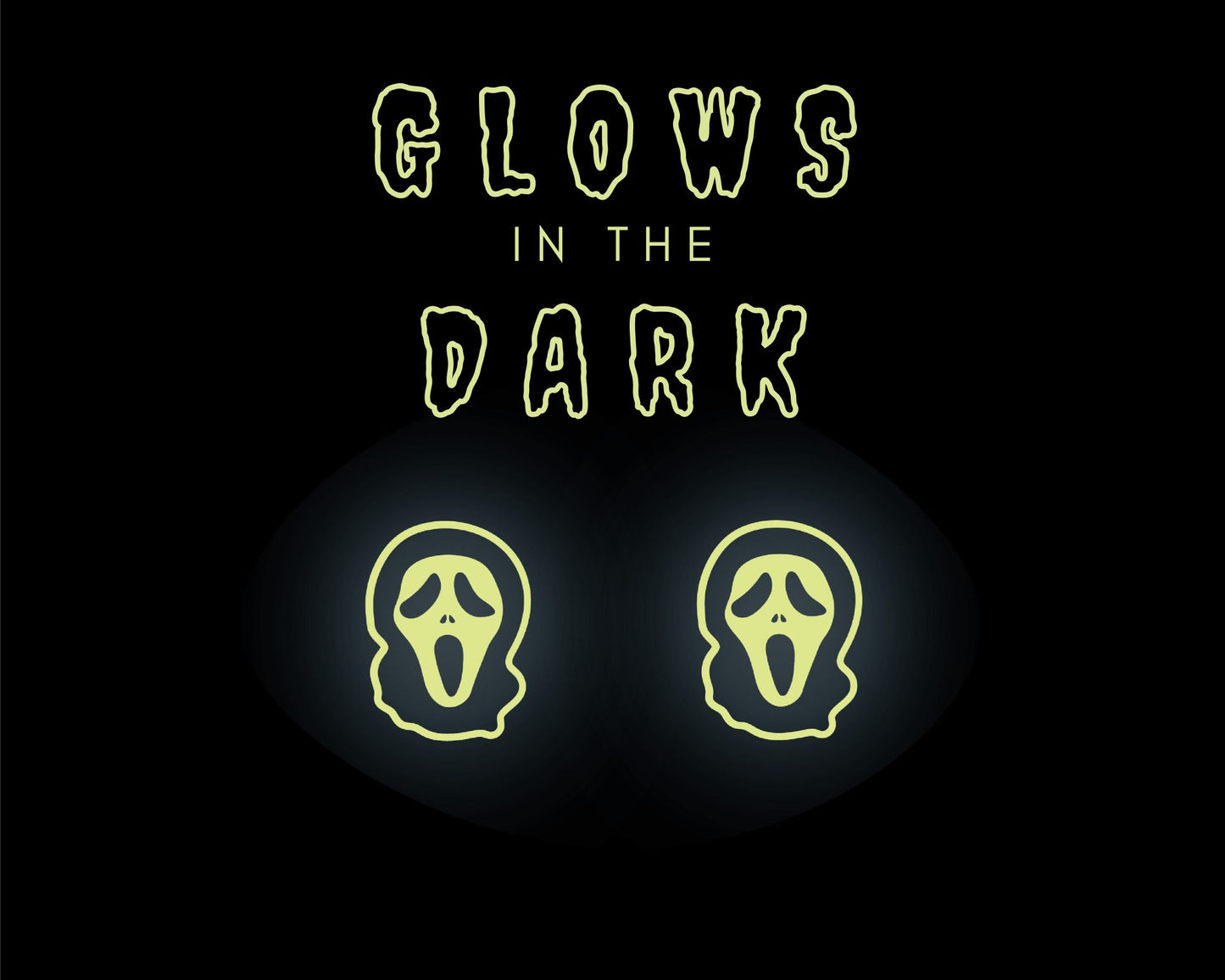 two glowing, spooky-looking faces against a dark background, accompanied by the text "GLOWS IN THE DARK" in a stylized font.
