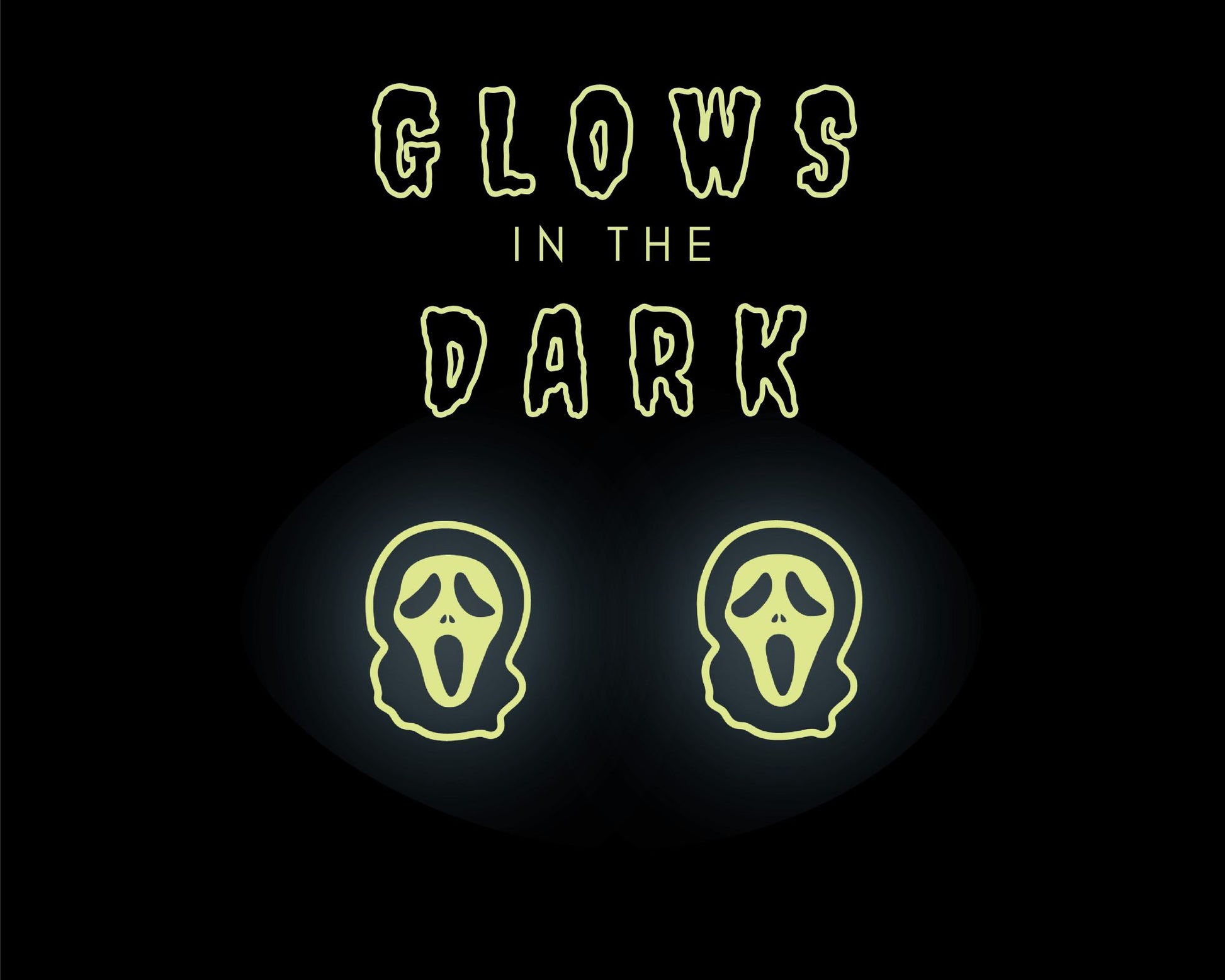two glowing, spooky-looking faces against a dark background, accompanied by the text "GLOWS IN THE DARK" in a stylized font.
